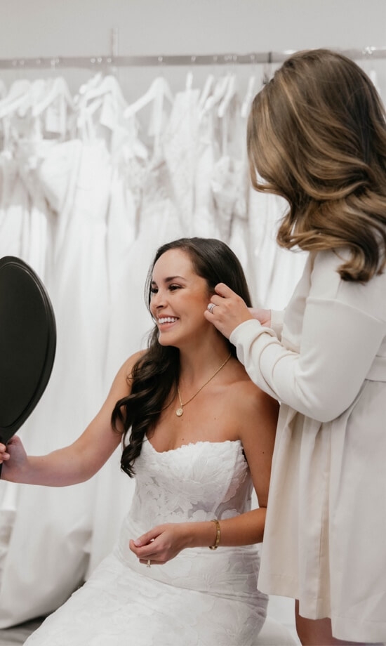 Model wearing a white dress